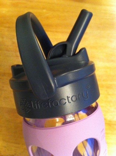 Handy built-in straw and pivoting handle