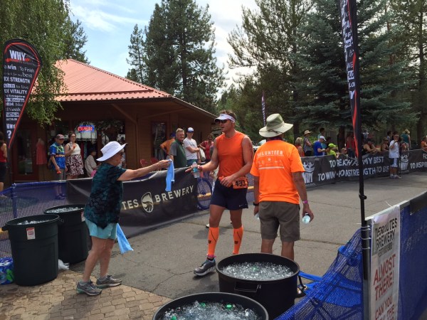 Ben crossing the finish line in the heat of the afternoon.